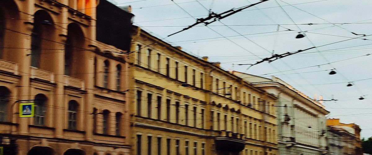Cyclist riding through a city intersection